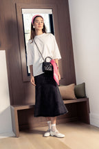 ALINE BLACK DENIM SKIRT WITH LEATHER PATCH