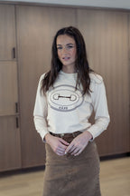 TAN TEE WITH HORSEBIT DESIGN